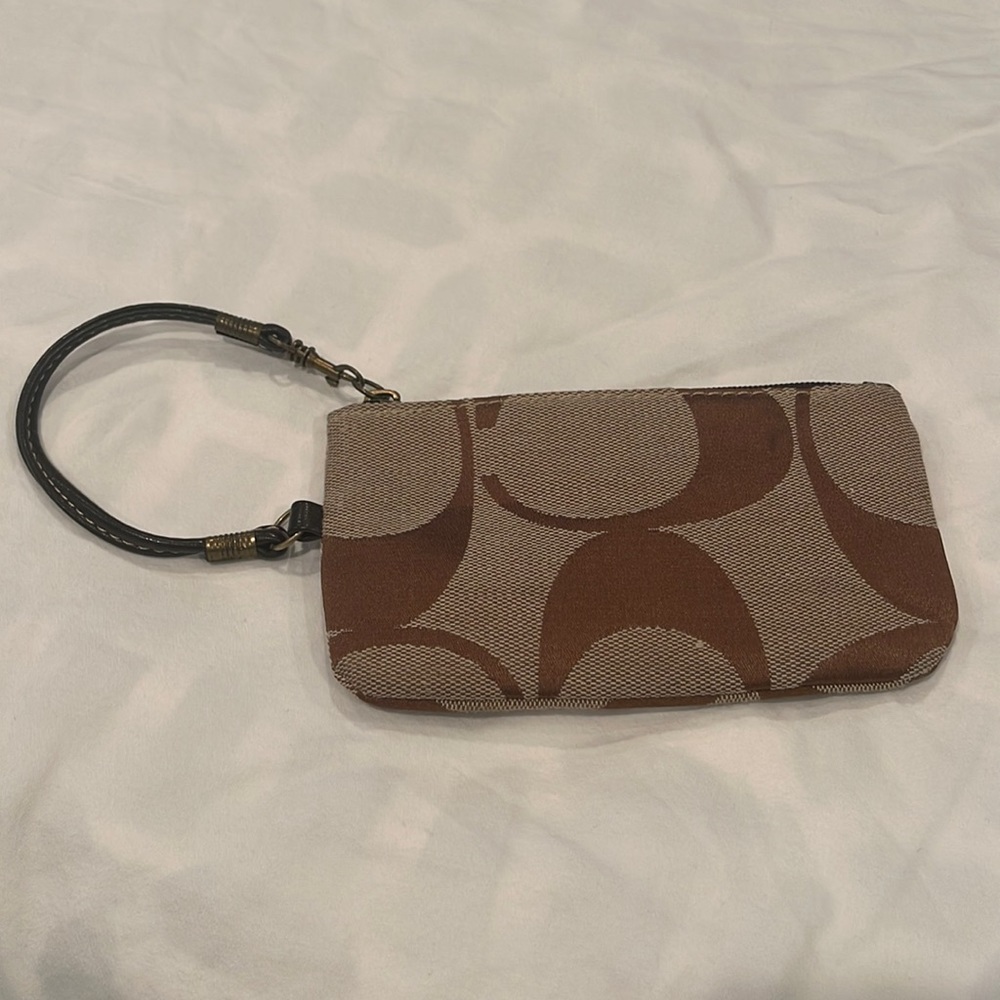 Super cute wristlet by Coach
